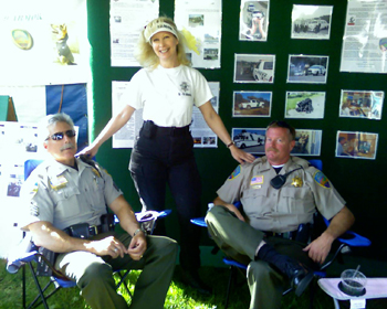 Click for big picture K9 Armor Co-Founders Sgt Mike Crain, Suzanne Saunders and Deputy Evan Hughes
