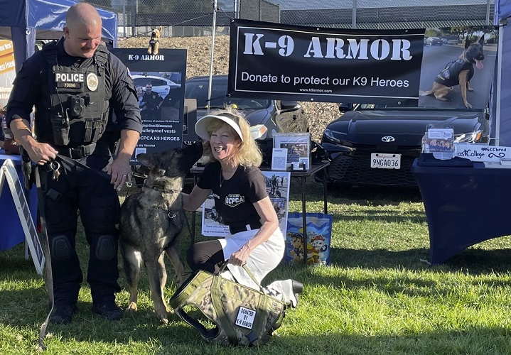 K9 Kisses from Anaheim Police Officer Chad Young and K9 Boone at the OCPCA K9 Trials 2024 where we fit test and promised Boone a custom-fit vest