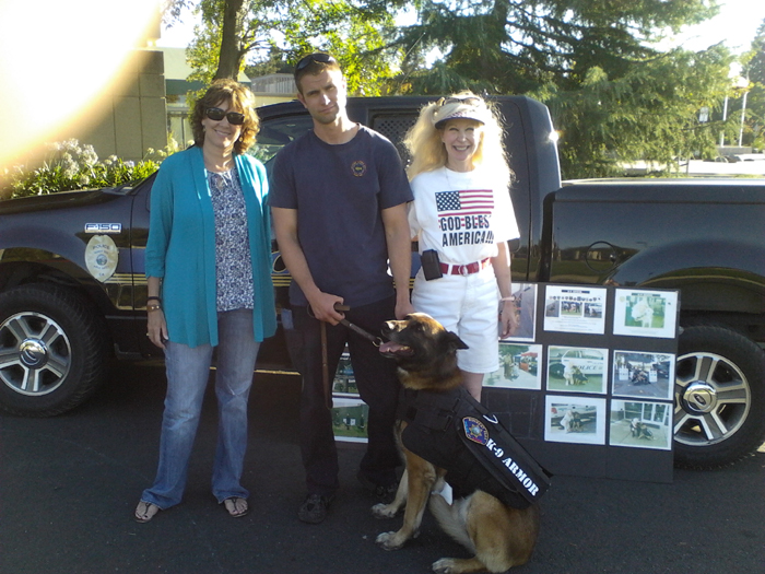 Rohnert Park PD K9 Kimo wears his K-9 Armor vest thanks to a donation by Carol Dunn pictured left with Officer Matt Snodgrass and K9 Armor Co-Founder, Suzanne Saunders