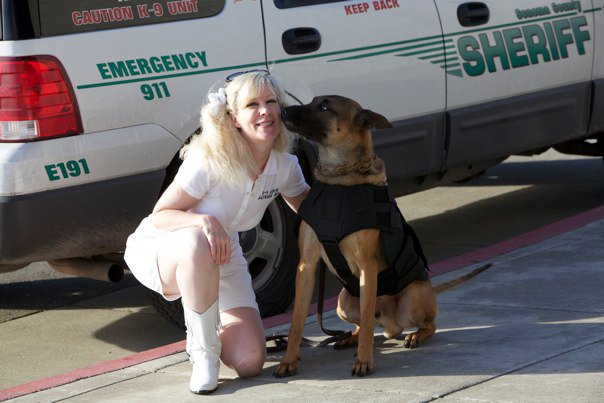 Sonoma County Sheriff K9 Axl giving kisses to Suzanne Saunders, K-9 Armor for his free bulletproof vest