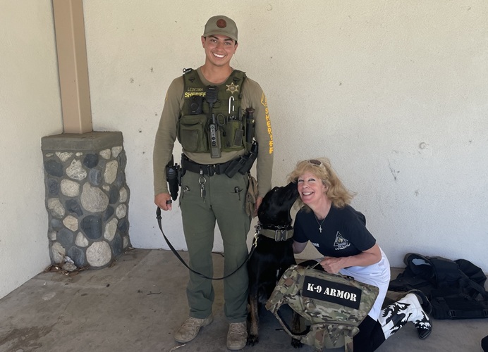 K9 Kisses from K9 Luca with Deputy Ledesma, Riverside Sheriff and K9 Armor cofounder Suzanne K9 Kisses from K9 Luca with Deputy Ledesma